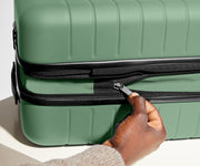 Hand unzipping the additional wraparound expandsion feature
