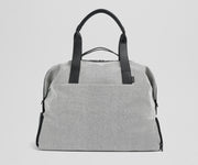 Front view of the Transit Canavs Weekender with its leather handles up