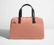 Front view of The Overnight Bag with leather straps up