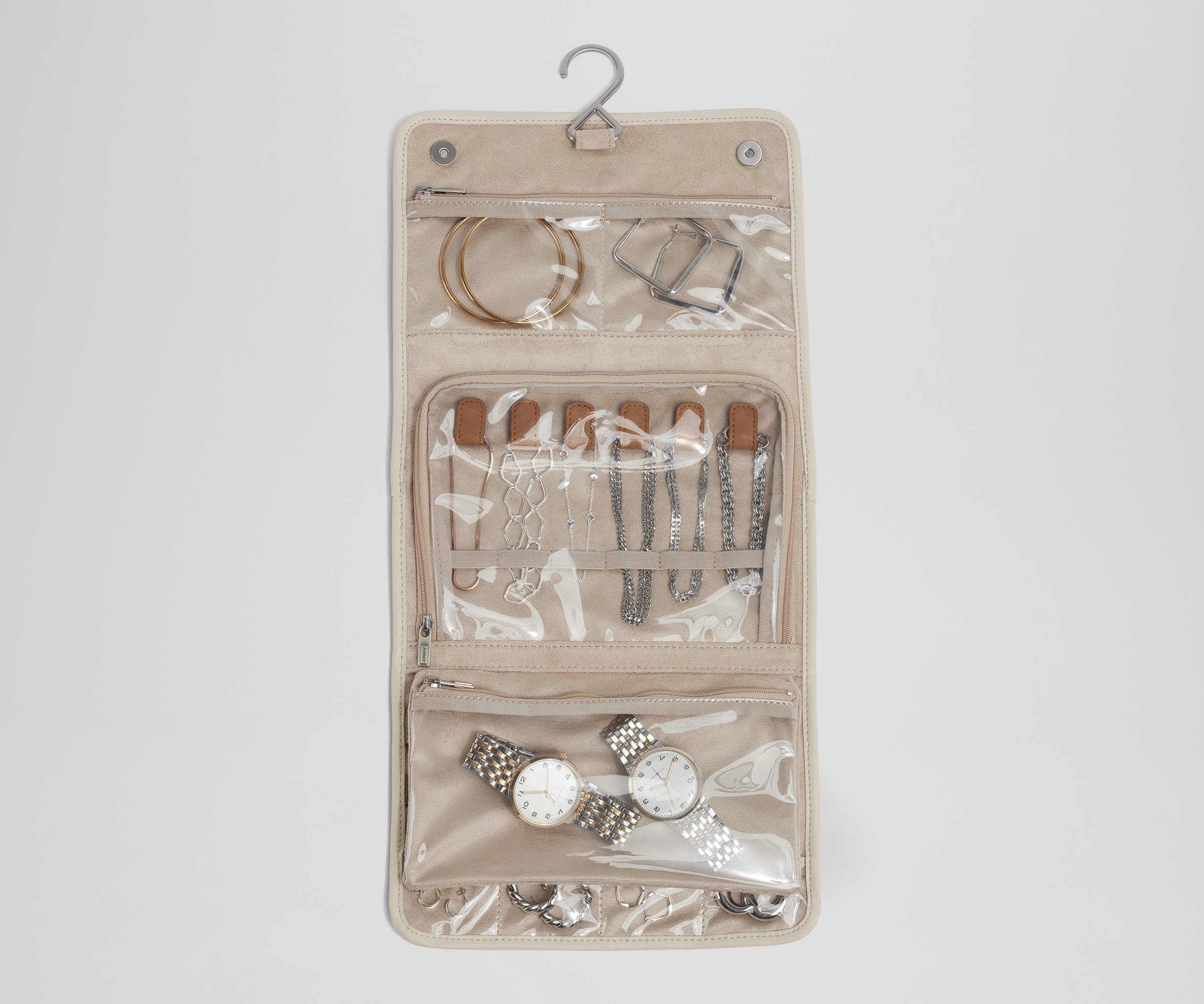 Unfolded Hanging Jewelry Oragnizer packed with jewelry and shown with the hook for easy hanging