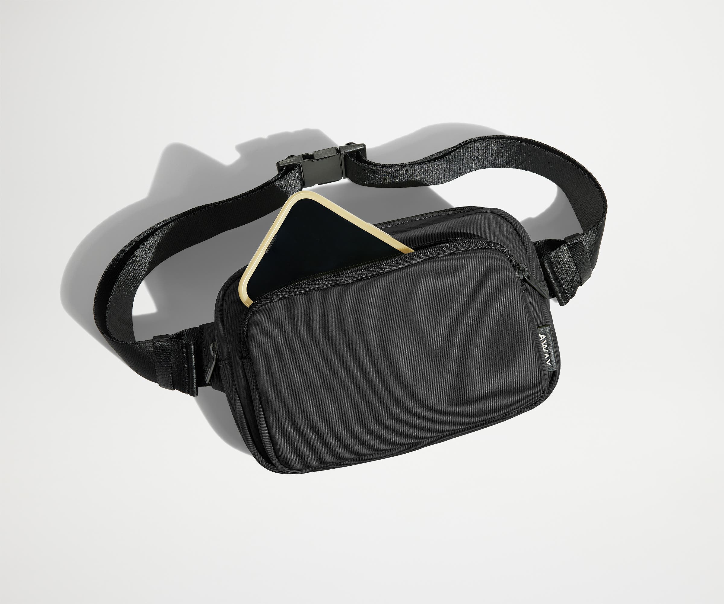 Exterior front pocket packed with a phone