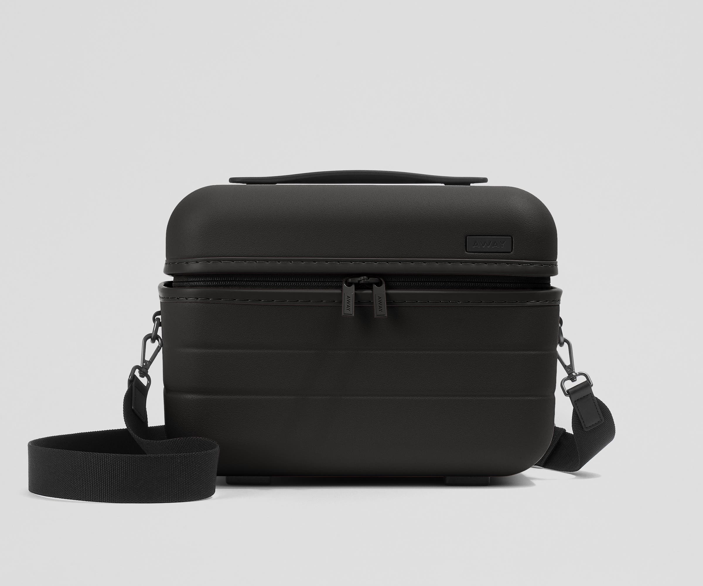 Front view of the Train Case with a detachable shoulder strap