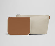Small leather pouch and large nylon pouch in contrasting colors