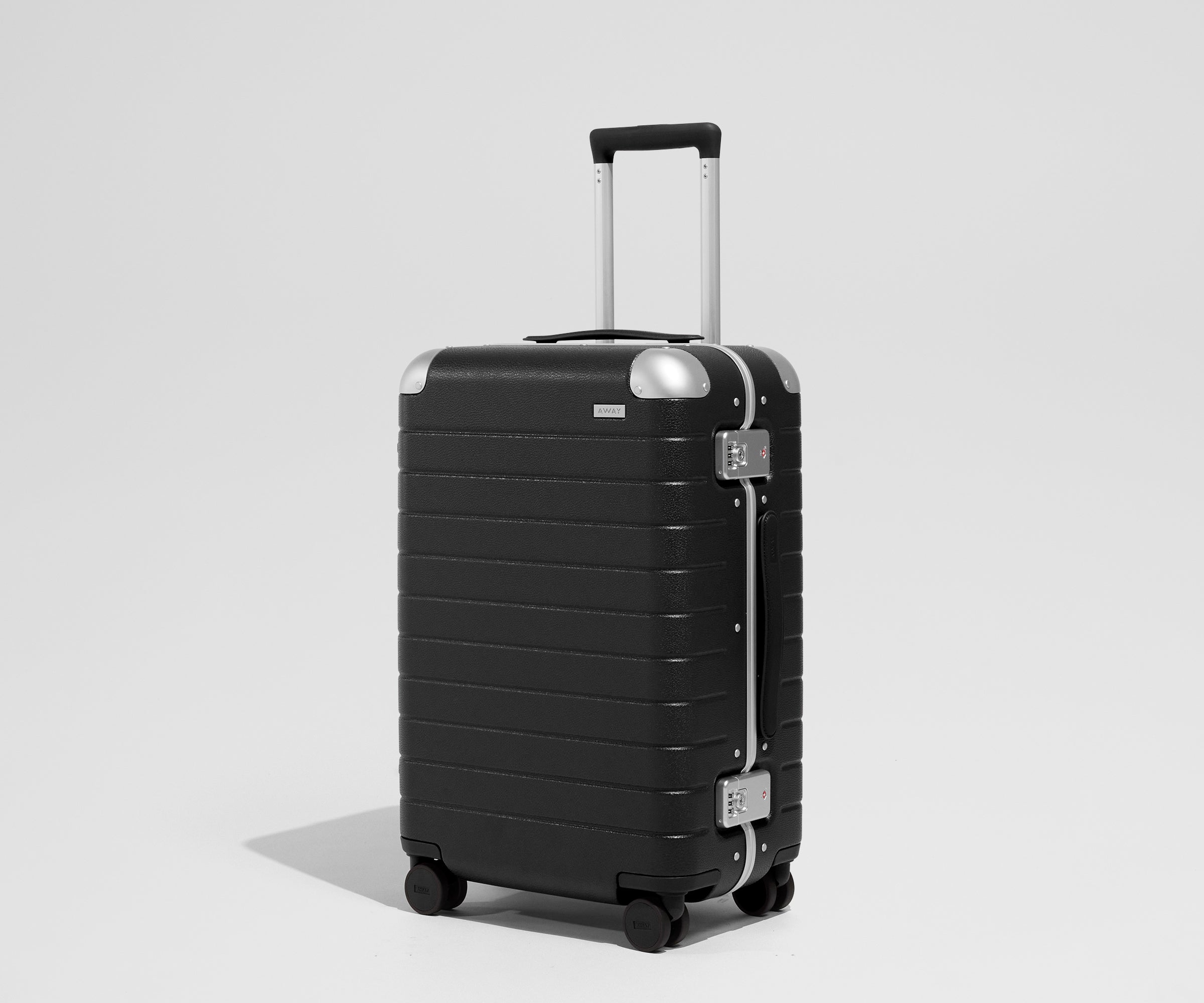 Aluminum Edge Bigger Carry-On in Jet Black Away