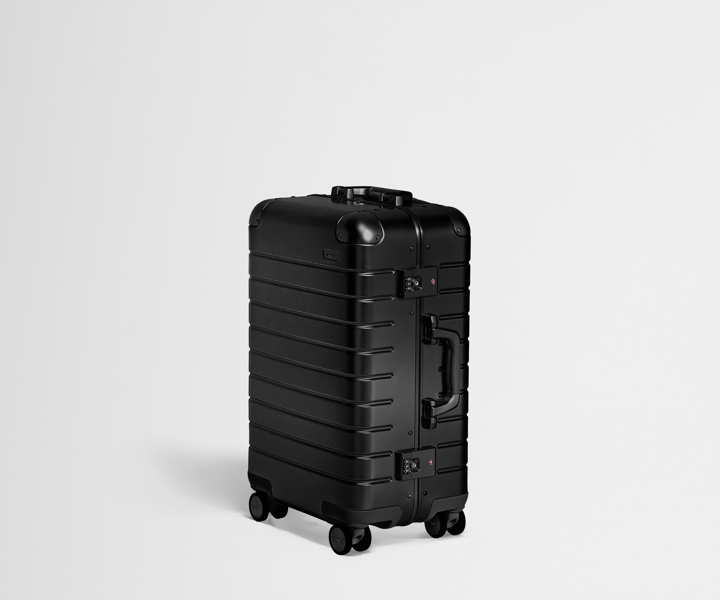 Angled product view of an Onyx Black Aluminum Bigger Carry-On