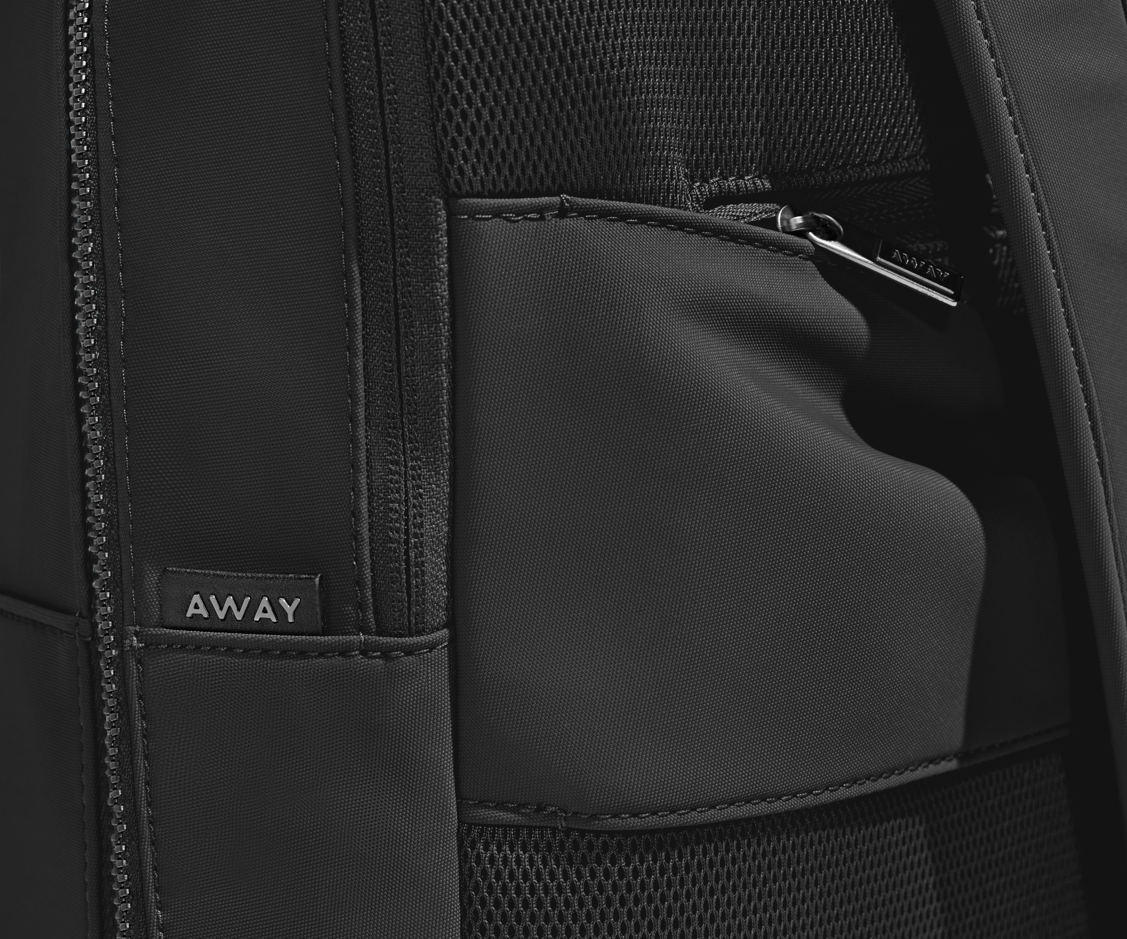 Close up view of the hidden zip pocket behind the trolley sleeve