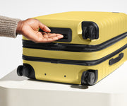 The Bigger Carry-On Flex in Sunshine Yellow