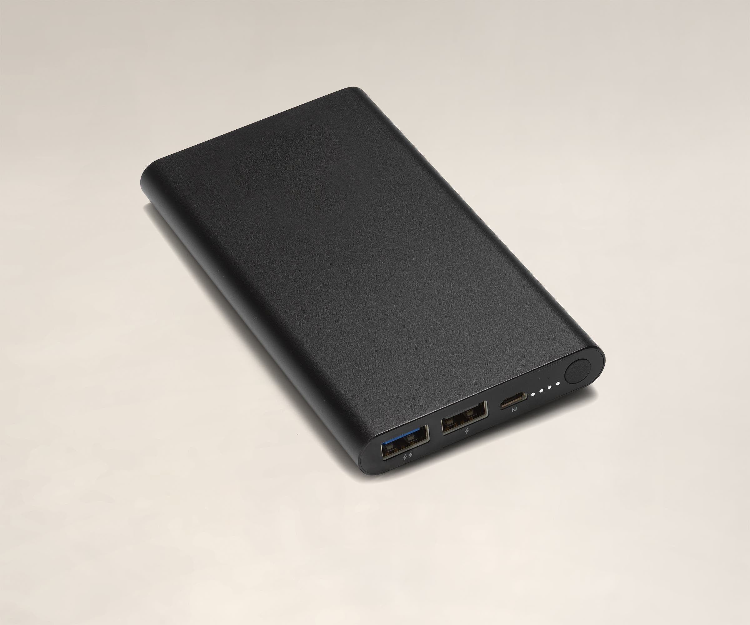 USB charger battery showing two USB-A ports, a micro-USB port, status lights, and a button to check the charge level.