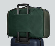 Active Convertible Backpack 45L secured to an Away suitcase by the luggage trolley sleeve
