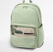 Phone, passport, and keys in their dedicated pockets in the front zip pocket