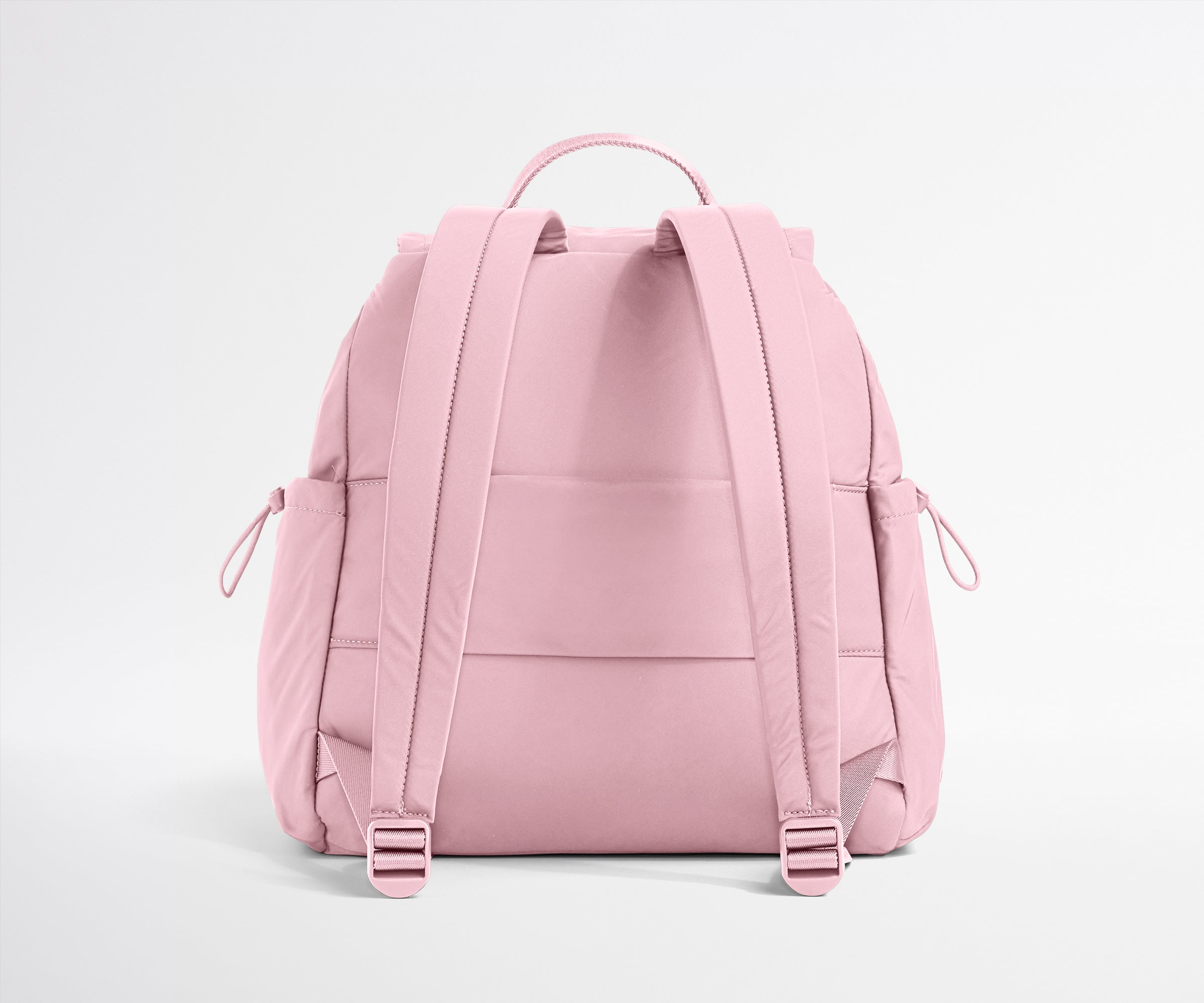 Pink backpack on a light gray background