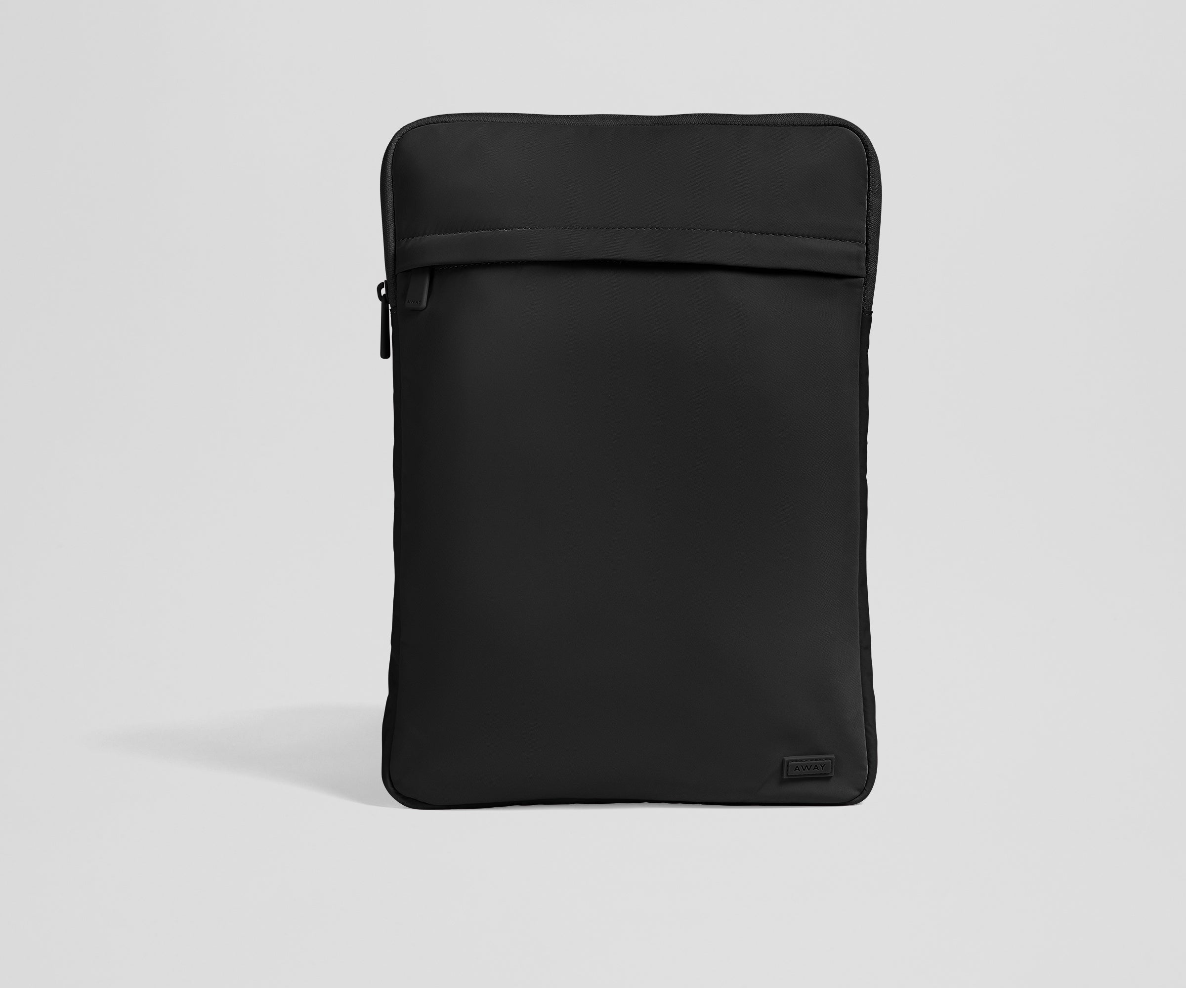 Black tablet sleeve on a light gray background