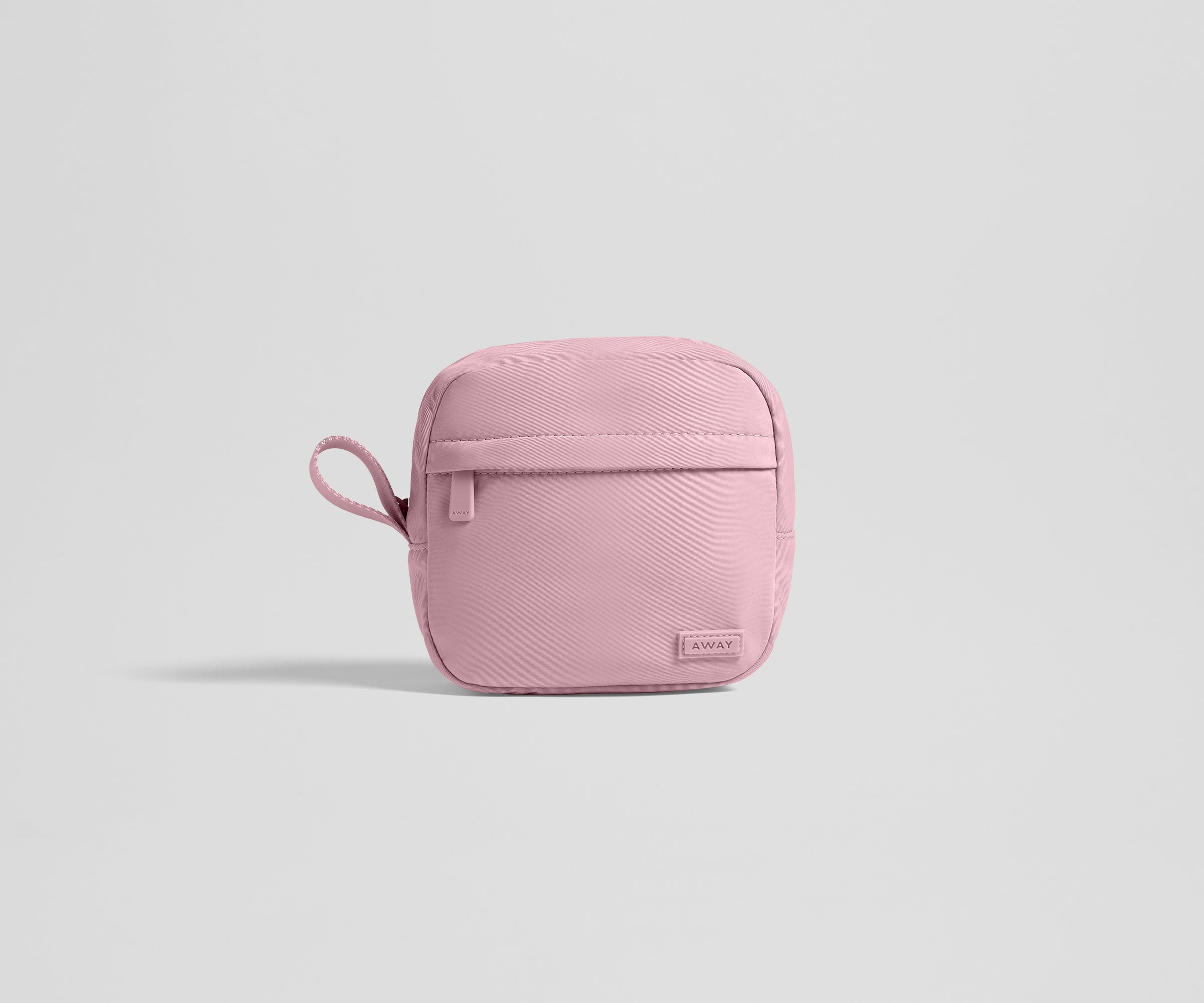 Pink tech case on a light gray background