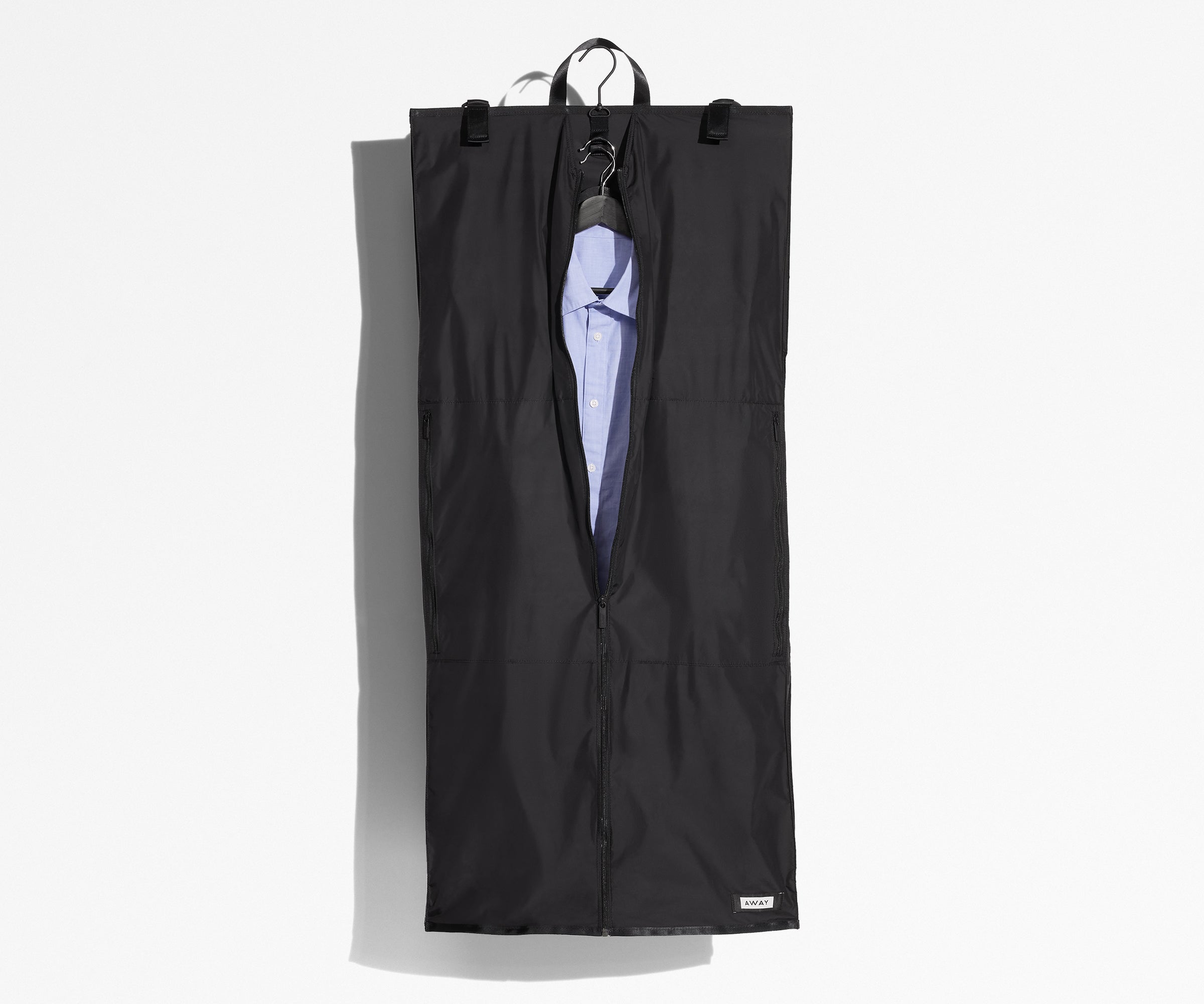 Checked sized Garment Sleeve packed with dress shirts