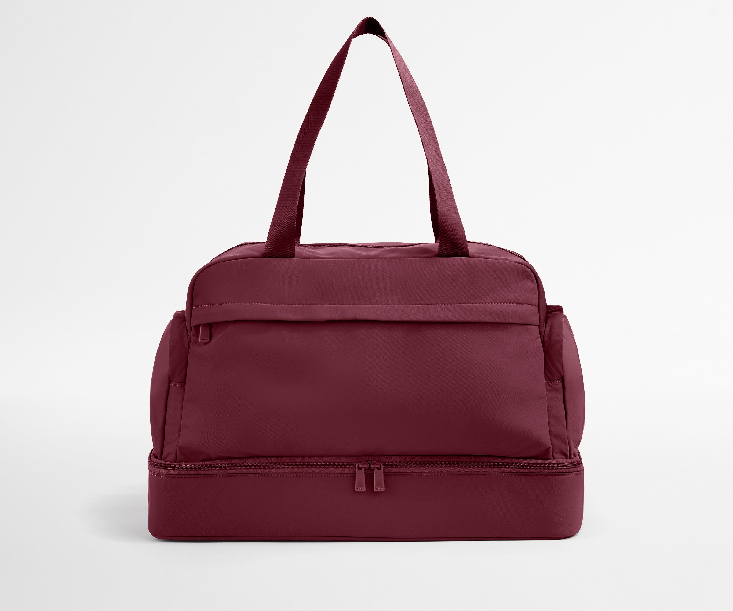 Maroon duffel bag on a light gray background