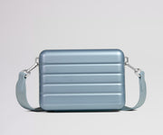 Blue crossbody bag on a light gray background