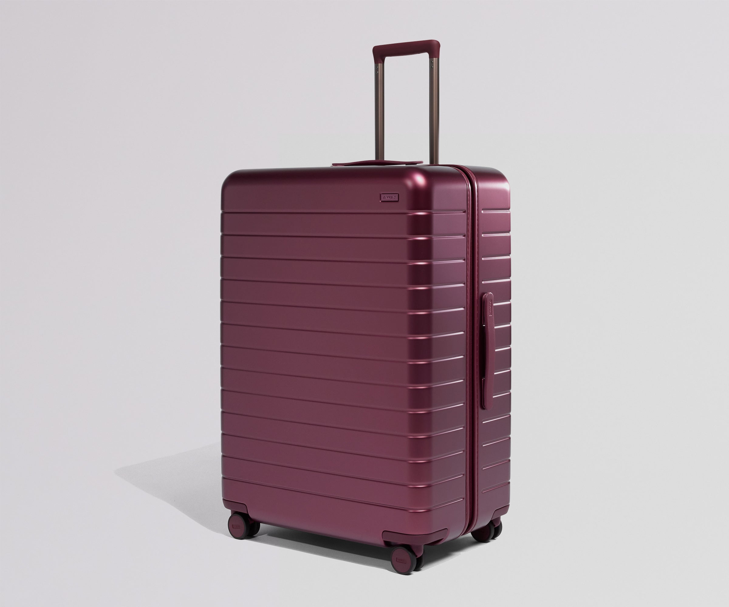 Shop Large Checked Suitcases in Ruby Haze Away