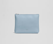 Light blue pouch with a brand logo on a light gray background