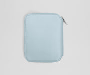 Light blue zippered pouch on a light gray background