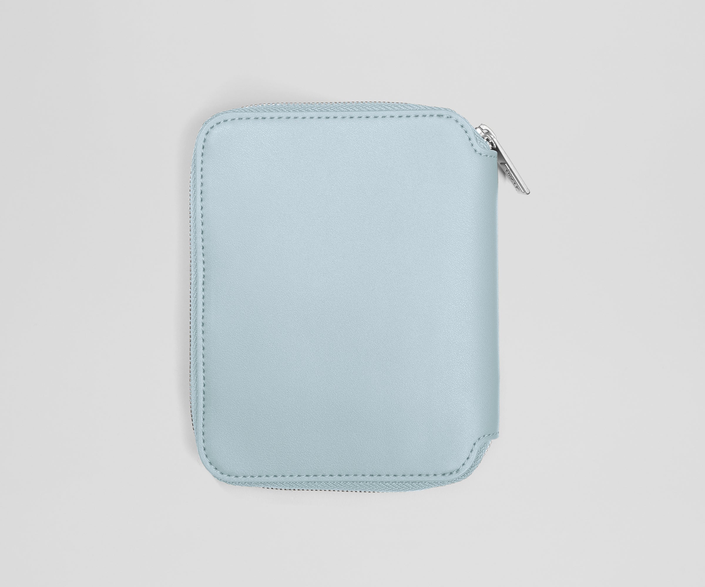 Light blue zippered pouch on a light gray background
