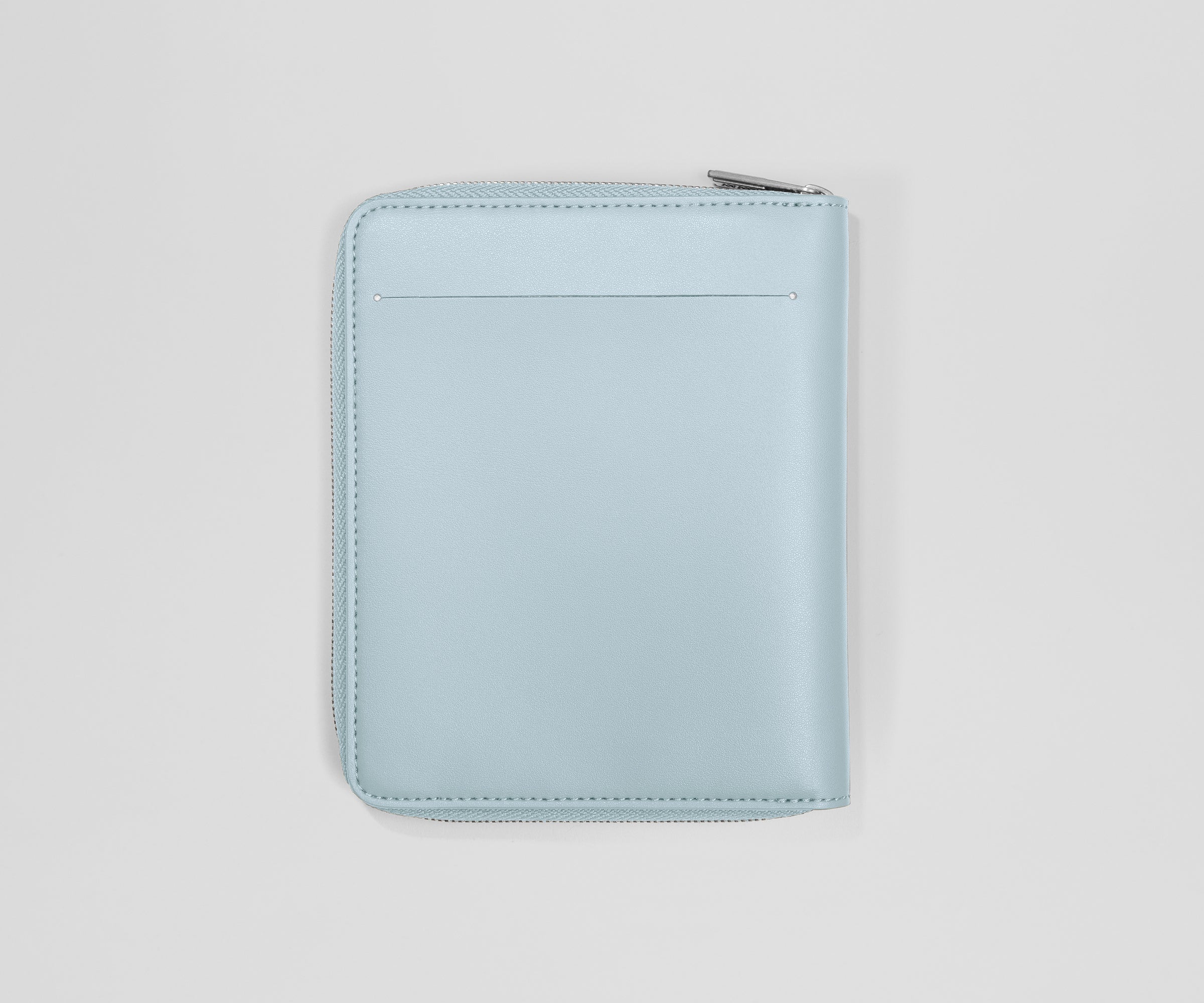 Light blue zippered leather wallet on a light gray background
