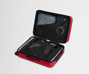 Red suitcase with black interior compartments on a light gray background