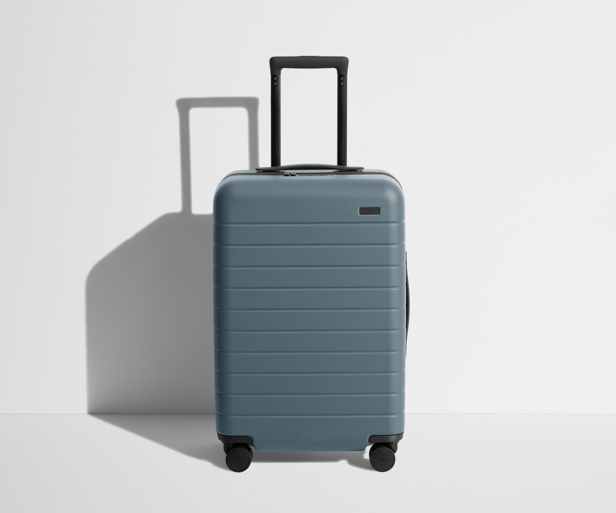 Shop The Bigger Carry-On suitcase in Coast Blue Away: Built for