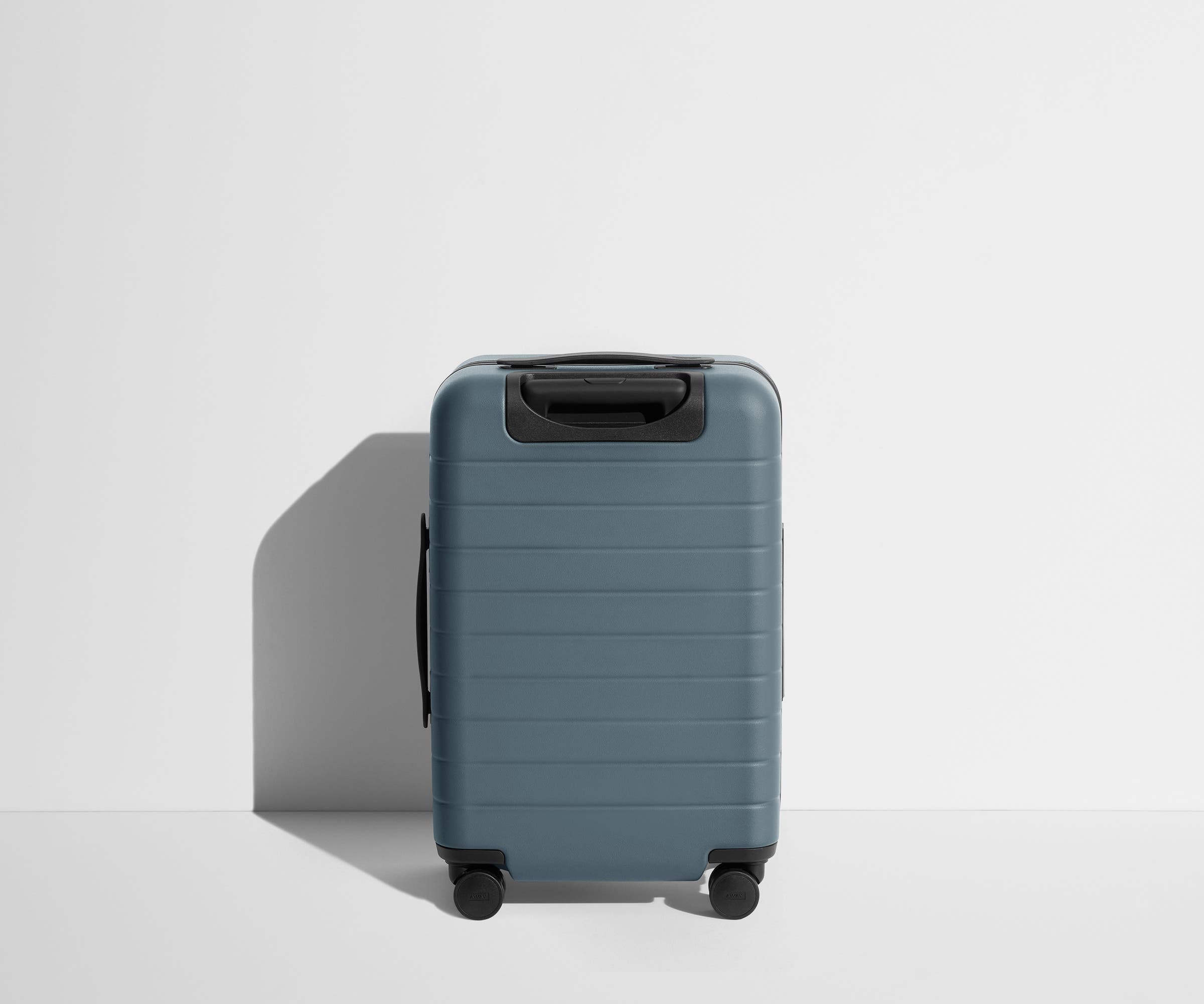 Back product view of The Carry-On Flex suitcase in Coast Blue