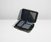 Four Insider Packing Cubes shown inside The Bigger Carry-On