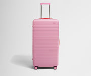 Front product view of The Trunk suitcase in Hot Pink