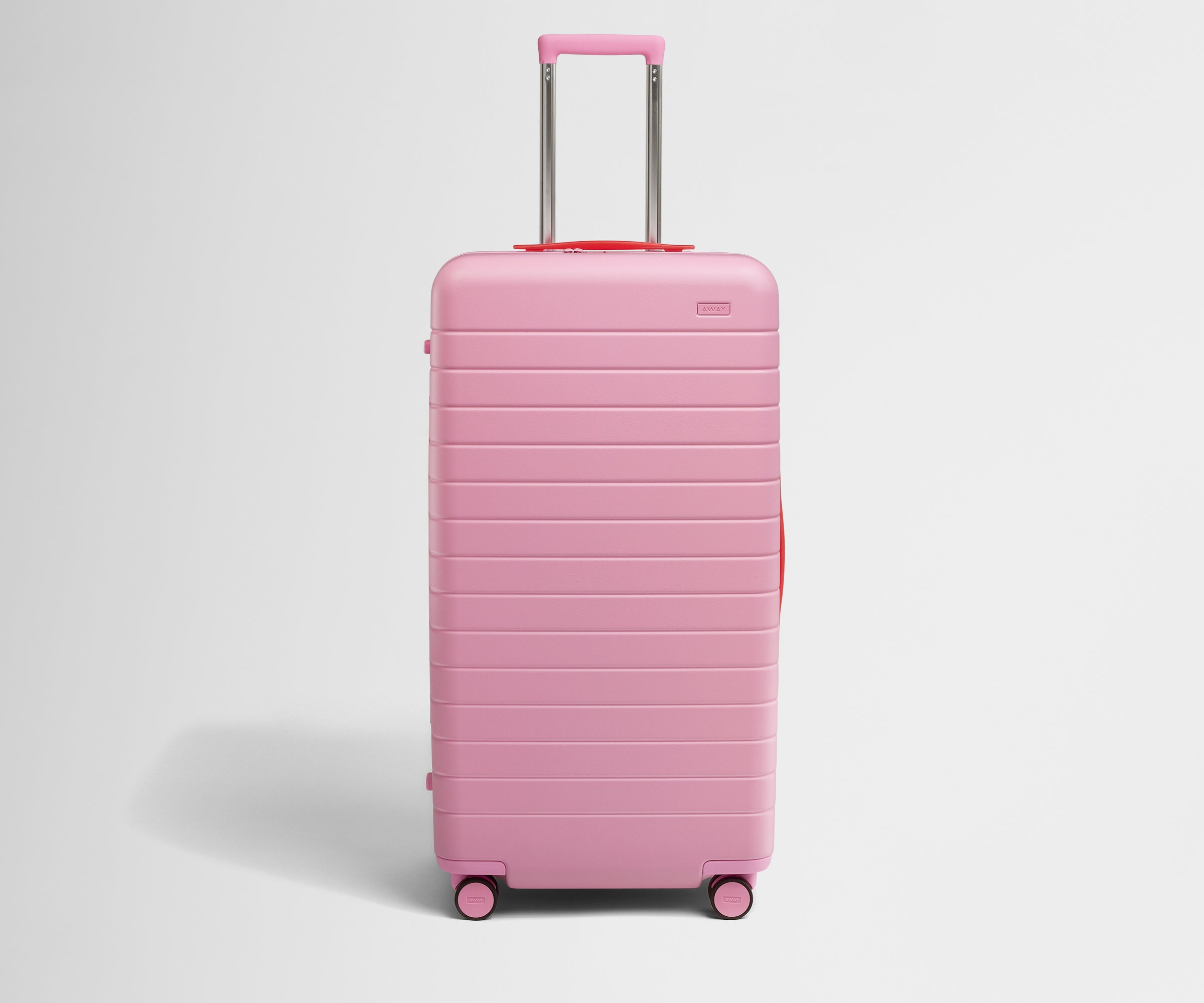 Front product view of The Trunk suitcase in Hot Pink