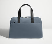 Front view of The Overnight Bag with leather straps up