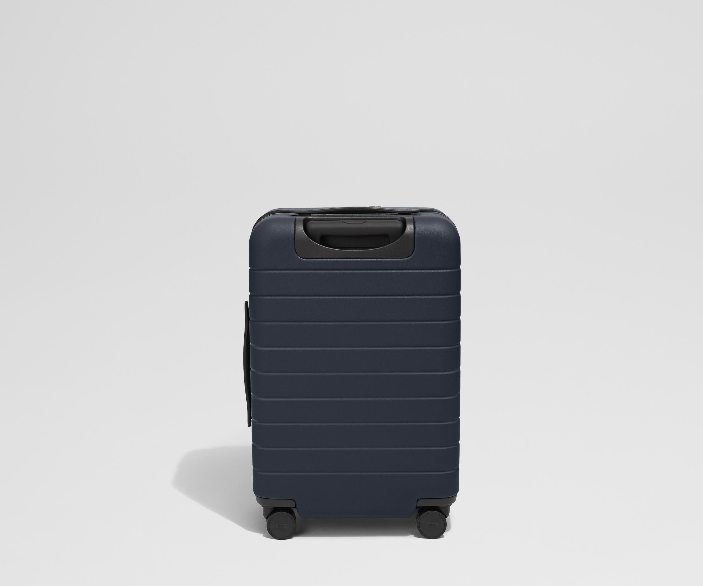 Back product view of The Front Pocket Carry-On suitcase in Navy Blue