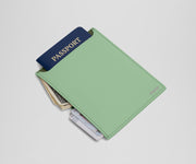 Passport wallet packed with a passport, money, and credit cards
