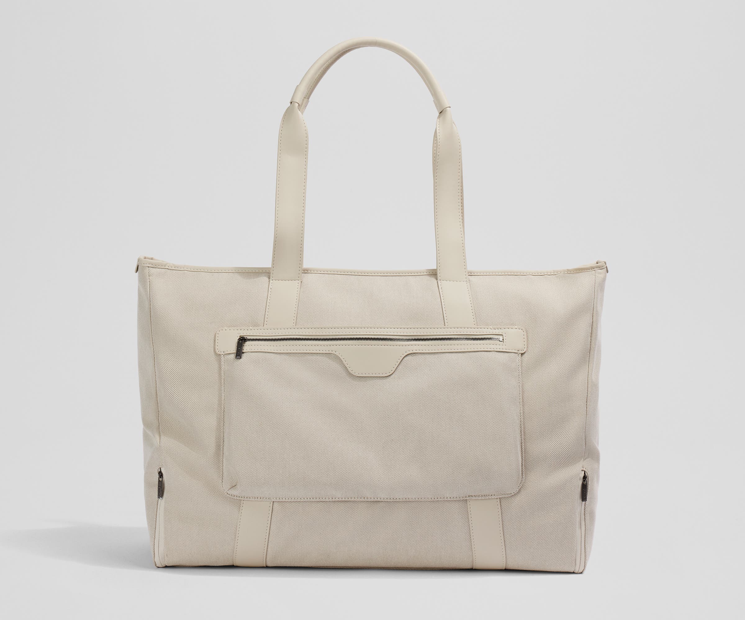 Trolley sleeve on the back of the Transit Canvas Tote