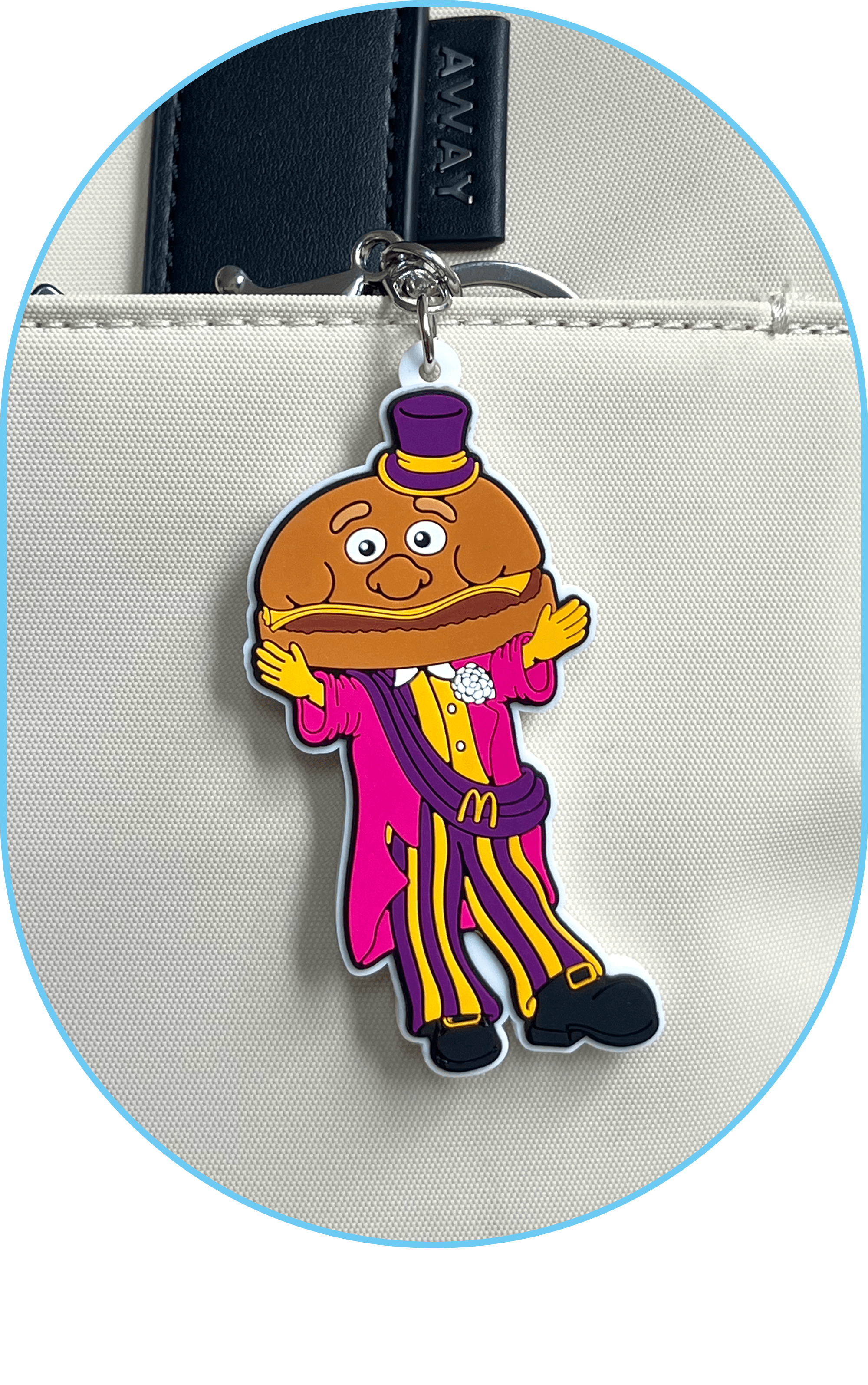 A Mayor McCheese luggage charm : Deluxe everything. Including the upgrade.