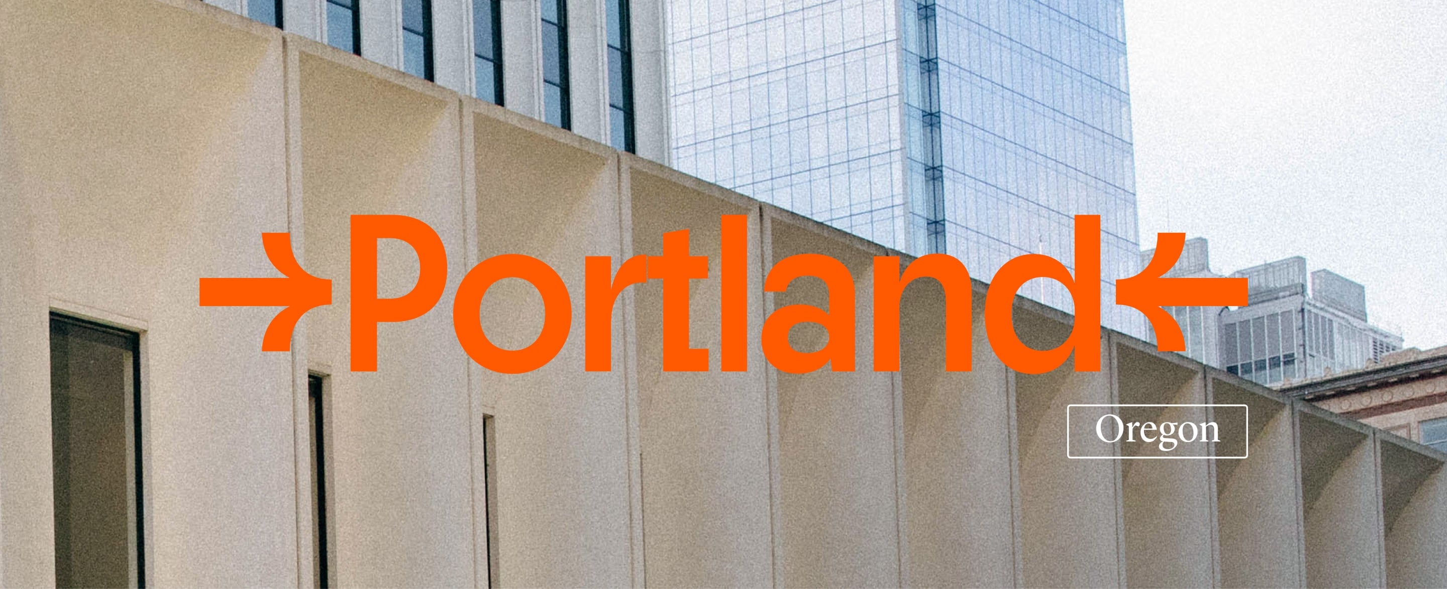 a close crop of the top of some buildings with the headline text