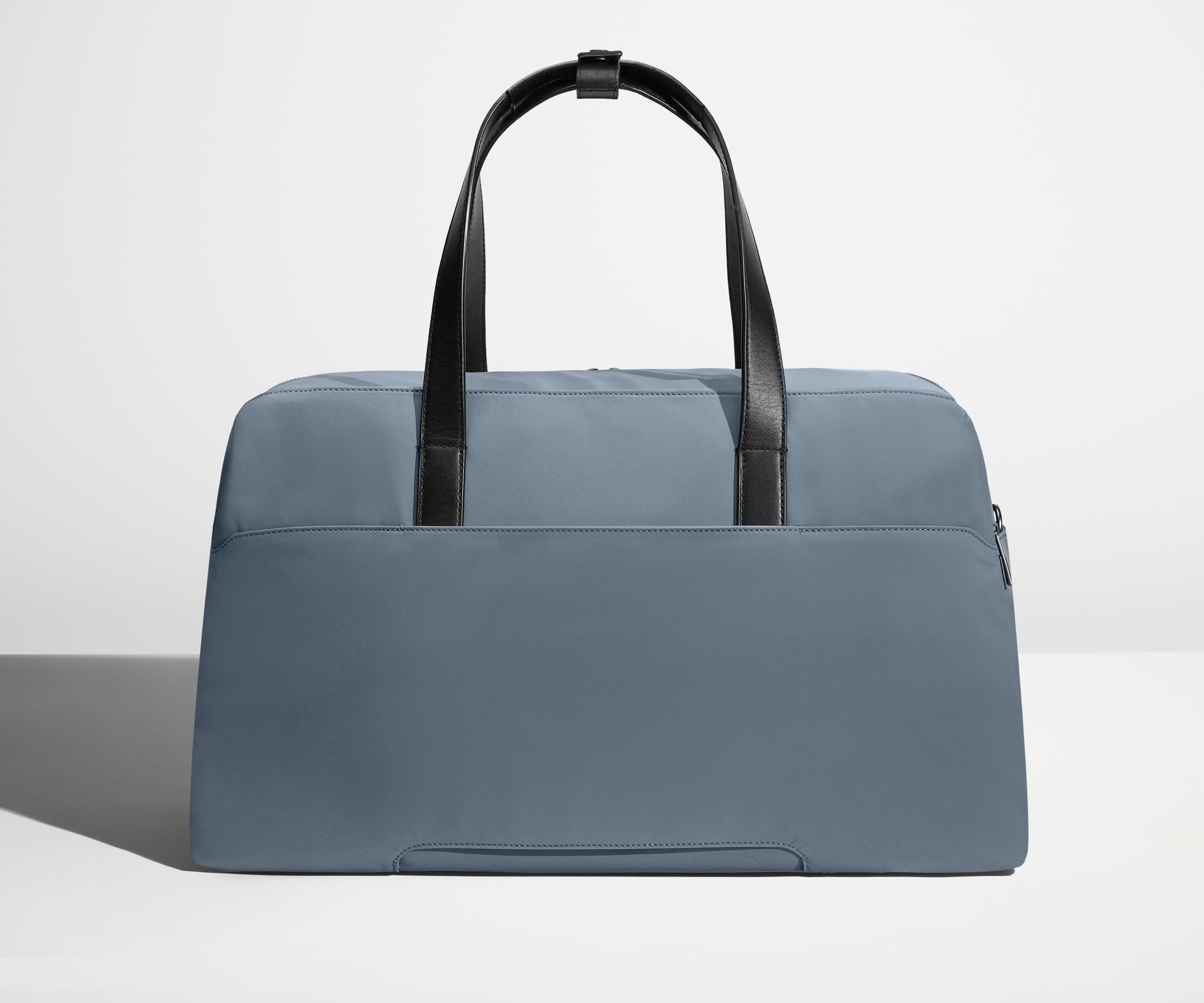 away travel duffel bag The Overnight in Coast Blue detachable padded shoulder strap with concealable D rings Away The Everywhere Duffle Bag