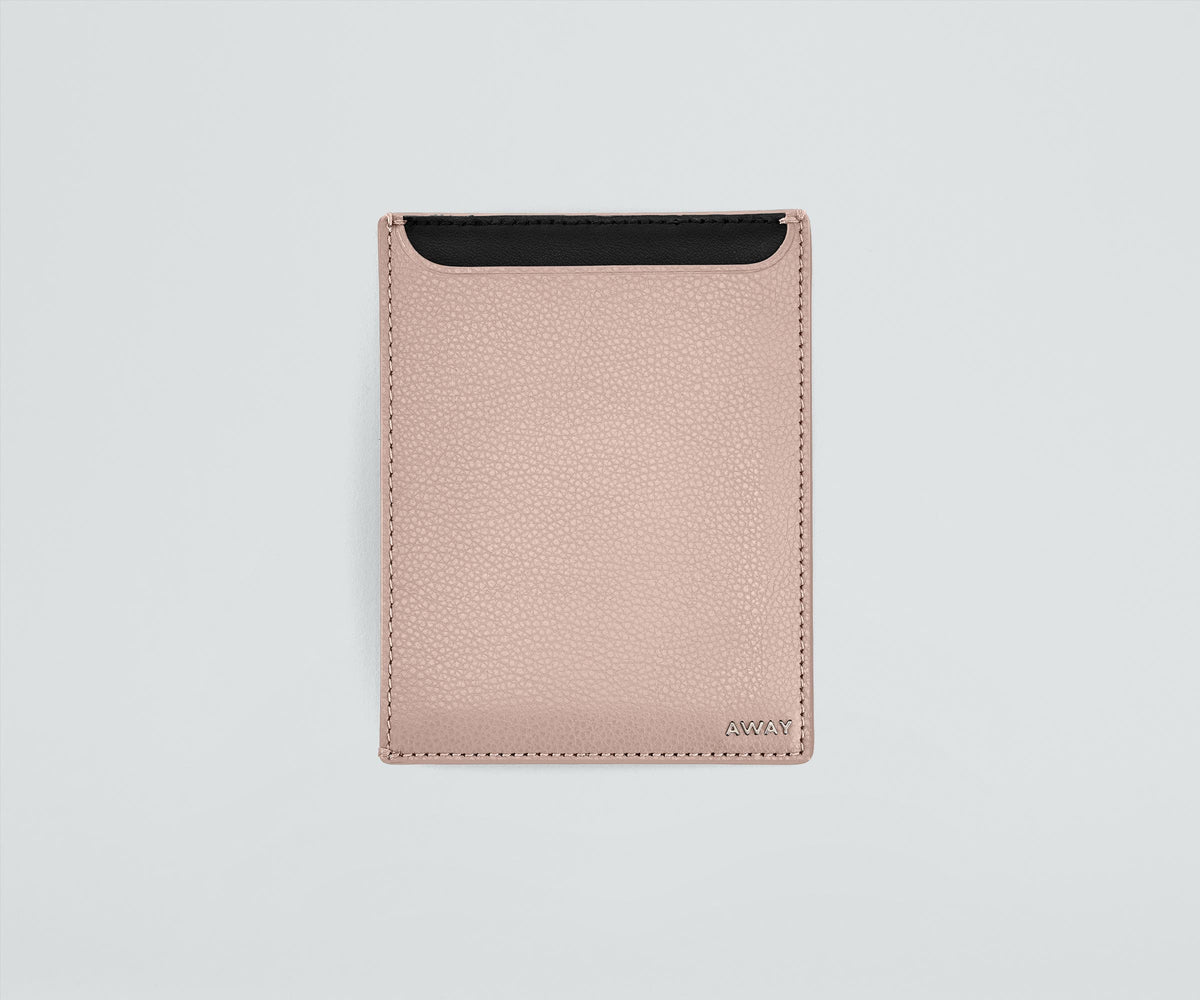 Front view of the passport wallet with a contrasting interior color