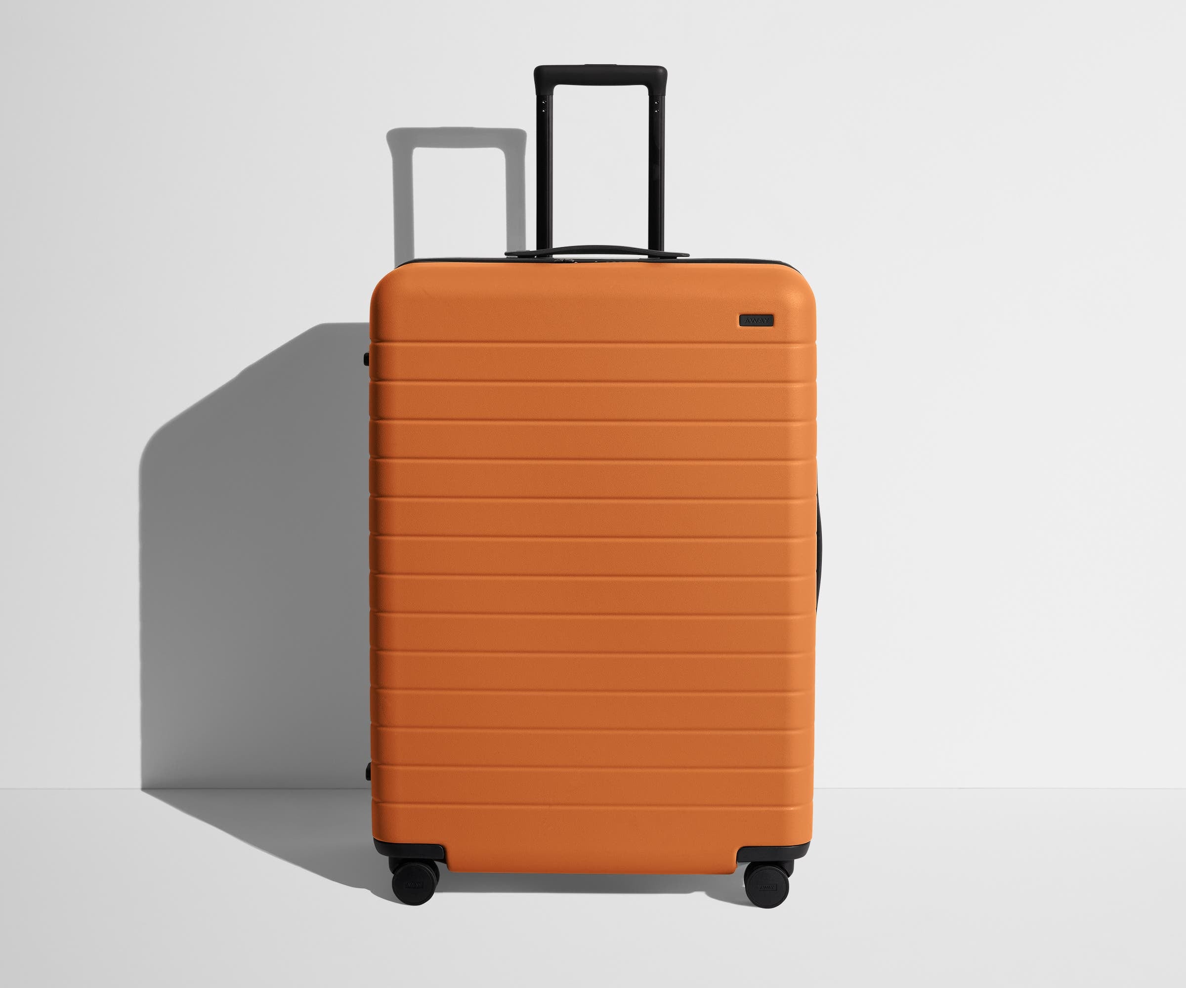 Shop Large & Checked Suitcases in Sorbet Orange | Away