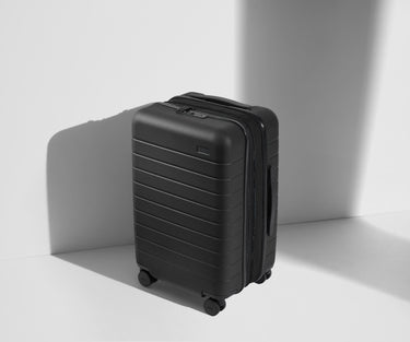 Angled product view of The Carry-On Flex suitcase in Jet Black