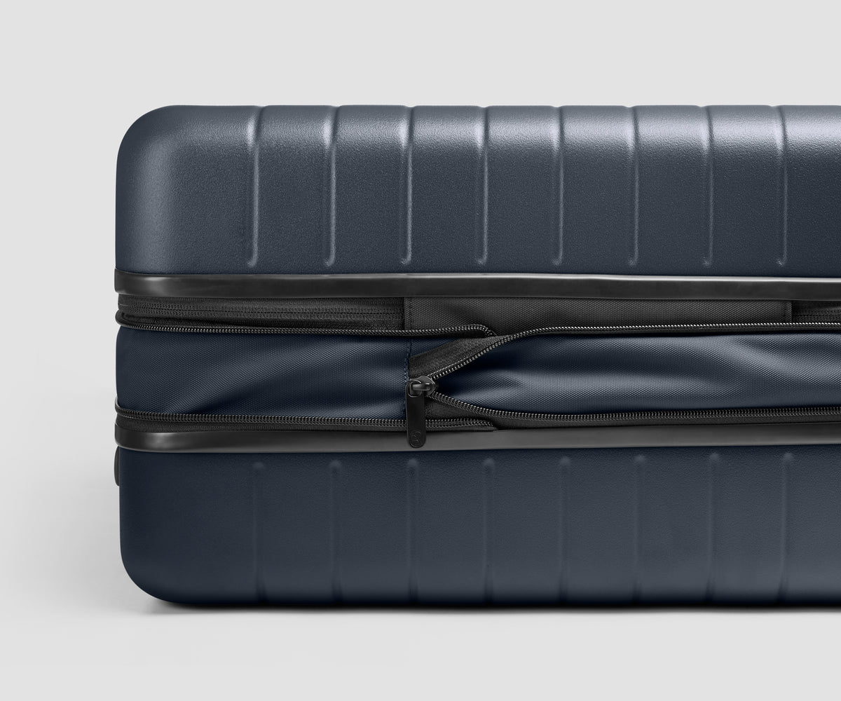 The Carry-On Flex 3 in Navy Blue