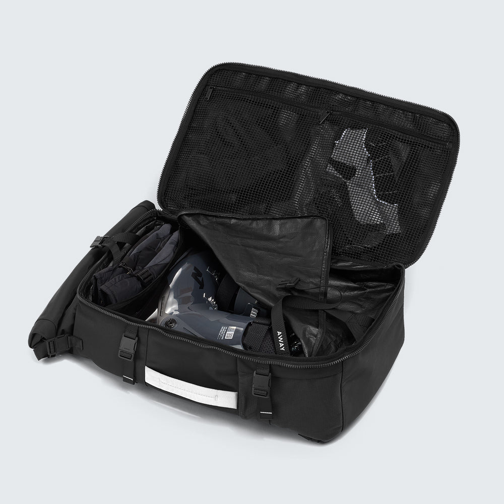 Shop the Carry-On Boot Bag 55L in Navy Blue| Away
