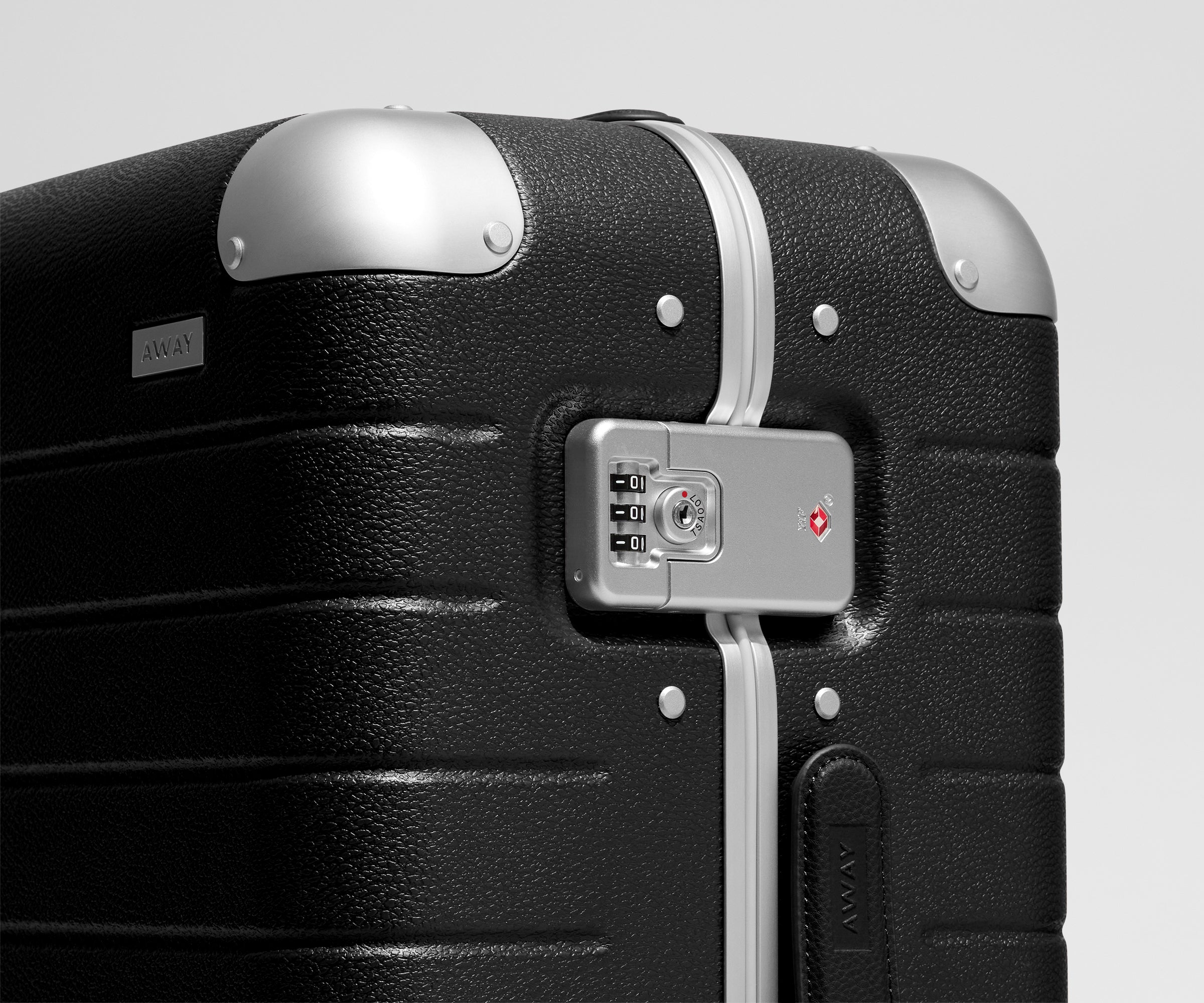The Aluminum Edge Bigger Carry-On in Jet Black
