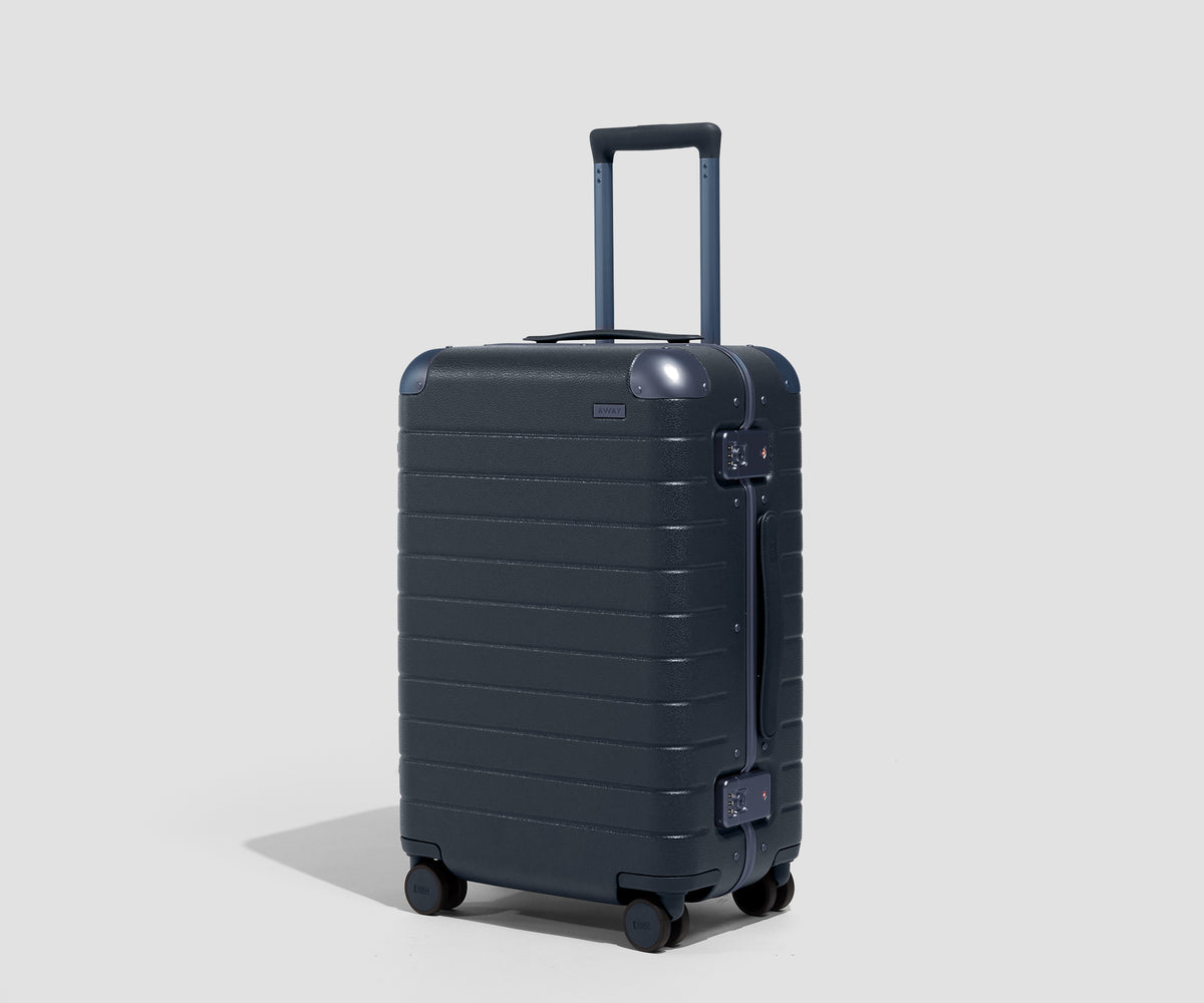 The Aluminum Edge Bigger Carry-On in Midnight Blue