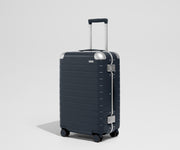 The Aluminum Edge Bigger Carry-On in Navy Blue