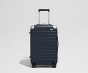 The Aluminum Edge Bigger Carry-On in Navy Blue