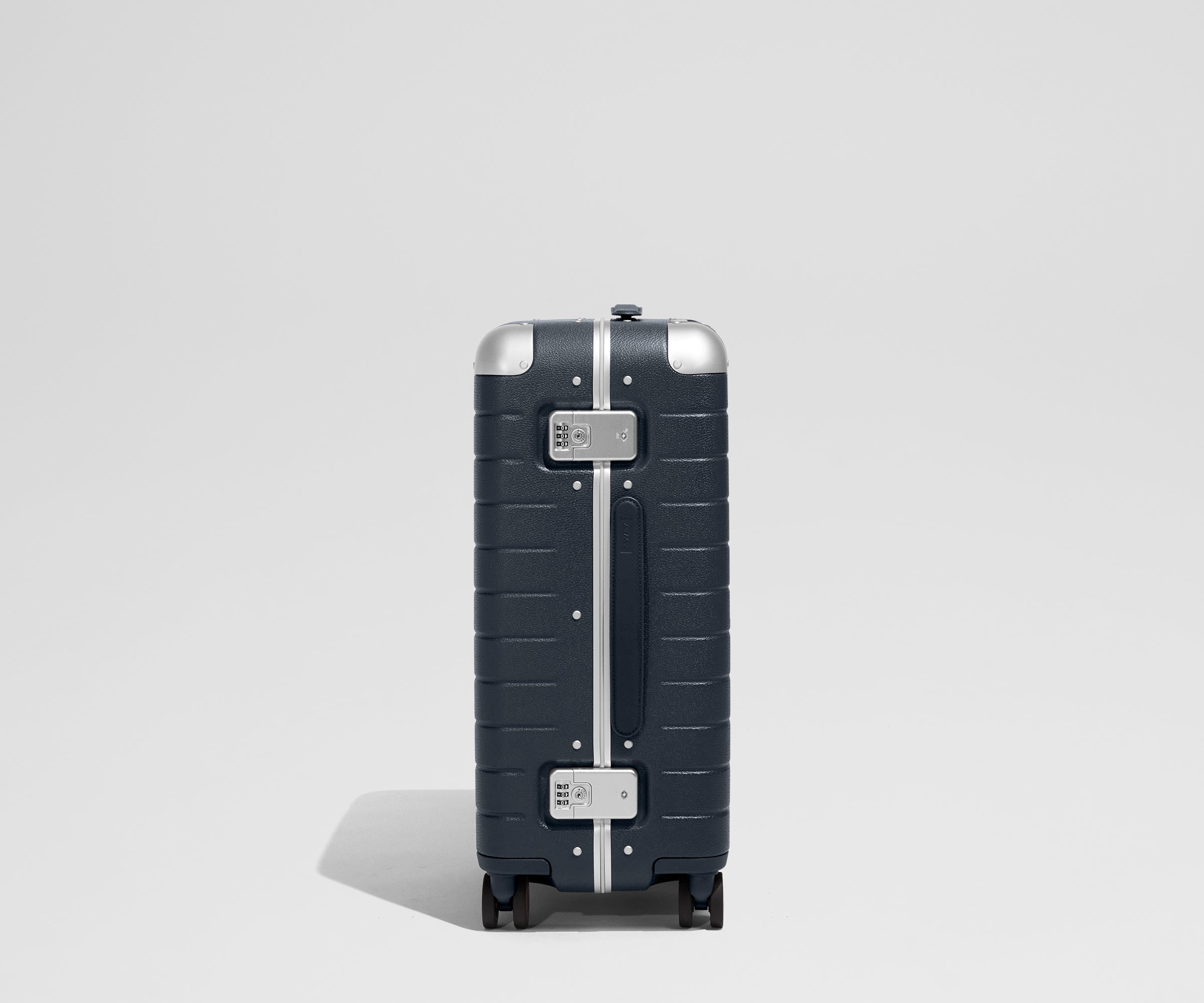 The Aluminum Edge Bigger Carry-On in Navy Blue