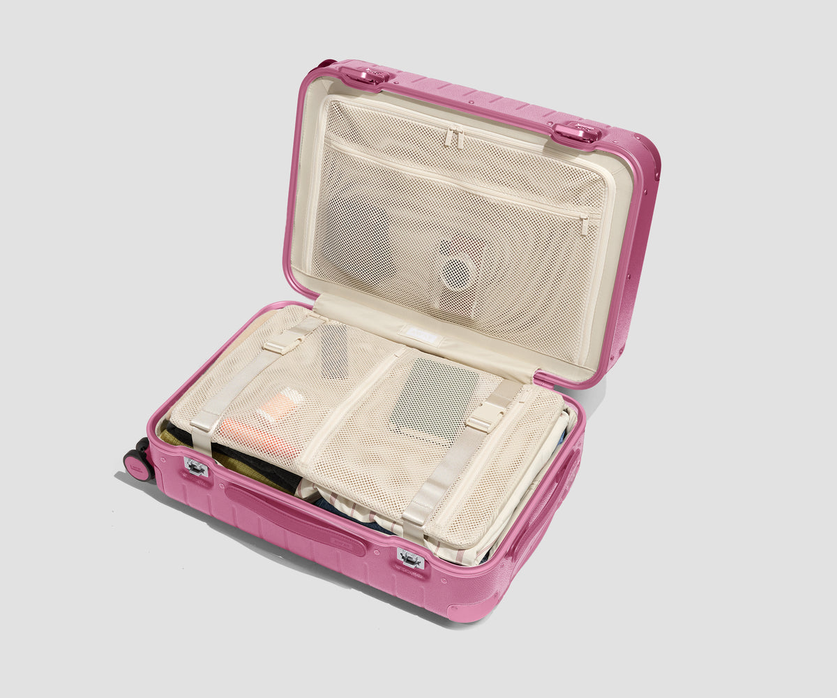 The Aluminum Edge Bigger Carry-On in Absolute Pink