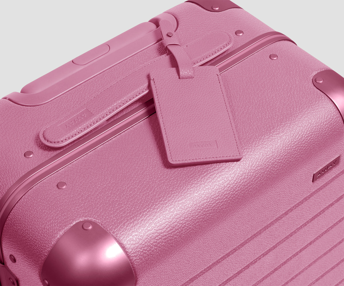 The Aluminum Edge Bigger Carry-On in Absolute Pink